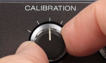 Man switching calibration button