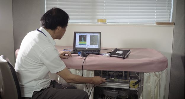 Engineer at Lily MedTech using RSA306 USB Spectrum Analyzer and EMC Test Software to perform pre-compliance tests