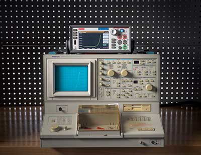 Keithley source measure unit with I-V curve tracer functionality alongside the original I-V curve tracer system from 1955.