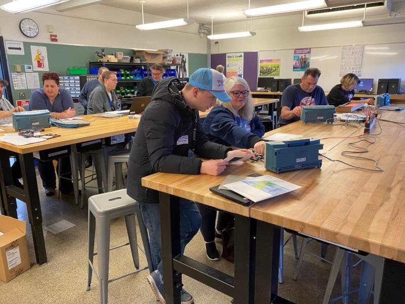 Teachers get familiar with the equipment at Sunset High School